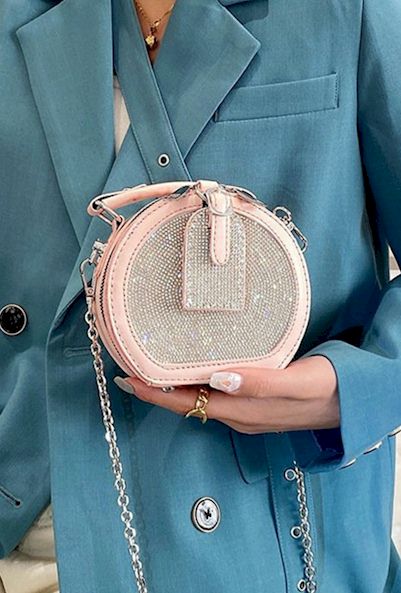 Dazzling Elegance: Embrace Sophistication with our Round-shaped Handbag